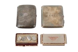 Two silver cigarette cases and a pair of cufflinks.
