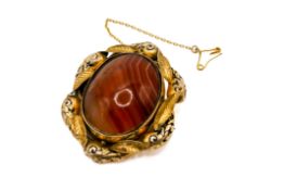 An early 20th century reversible gold plated brooch.