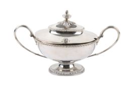 A late 18th/early 19th century silver twin-handled pedestal bowl with lid.