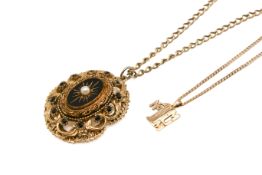 Two 9ct gold chains with gold and gilt pendants.