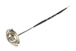 A George II white metal toddy ladle.
