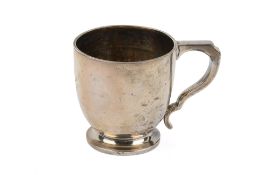 An early 20th century silver christening mug.