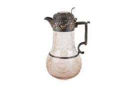 A Victorian silver mounted cut glass claret jug.