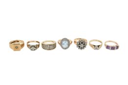 Seven 9ct gold dress rings.