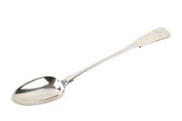 A large Georgian silver serving spoon.