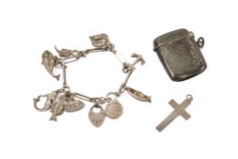 A small group of silver and white metal items.