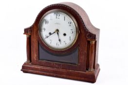 An oak cased mantel clock 'Rich, Bridgwater'.