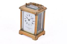 An early 20th century French brass cased carriage clock retailed by Goldsmiths & Silversmiths Co.