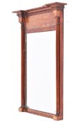 An early 20th century mahogany and string inlaid rectangular framed mirror.
