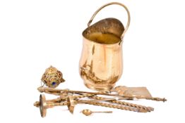 A small group of assorted brassware. Including a Brass coal bucket and fire side tools, etc.