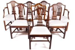 A set of eight 20th century Georgian style dining chairs.