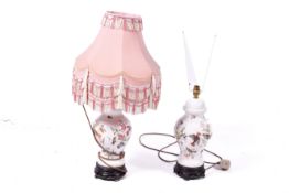 A pair of modern Chinese style ceramic ginger jar table lamps.