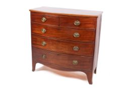 An Edwardian mahogany bow fronted chest of drawers.