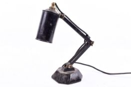 Vintage scratch built adjustable work lamp. Raised on an octagonal wooden base.