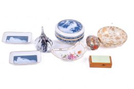 A small collection of assorted ceramic and glass ornaments.