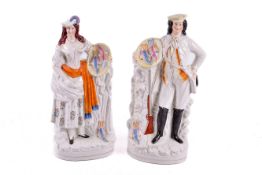 A pair of Staffordshire style flatback pottery figures - Hunter and Lady selling birds.