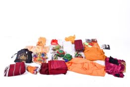 A collection of assorted Asian fabric items. Including scarves, robes, mediation cushions, etc.