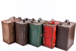 Five vintage 2 Gallons fuel cans. Including Shell and BP, with caps.