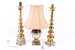 A pair of brass candlestick type table lamps and another (3).