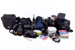 Collection of assorted vintage film and digital cameras with photographic accessories. Mostly cased.