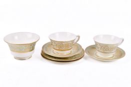 Two Royal Worcester Embassy trios and a sugar bowl.