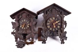 Two Black Forest cuckoo clocks (AF).