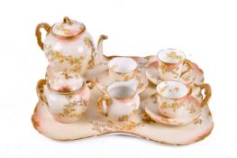 A 19th century French D&G porcelain tea set for three on a tray.