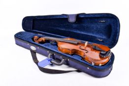 Antique unbranded violin having one piece back in a modern fitted case. With chin and shoulder rest.