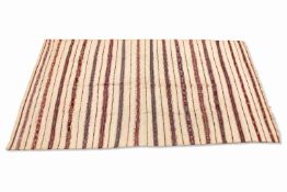 A large vintage Moroccan throw or floor covering.