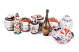 A collection of assorted Oriental items, mostly ceramics.