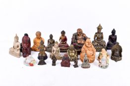 Collection of assorted Buddhas and other deity figures.