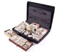 A collection of assorted loose and albums of vintage trading cards in a briefcase.