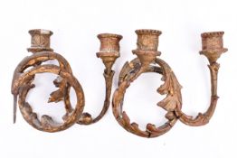 A pair of vintage French Rococo gilt plaster candlesticks (af). Having scrolling leaf decoration.