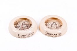 Two vintage Guinness advertising Ashtead pottery ashtrays.
