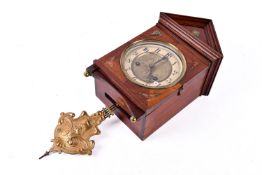 A late 19th/early 20th century mahogany cased pendulum wall clock.