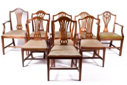 A set of nine mahogany dining chairs.