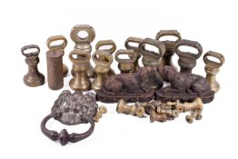 Quantity of brass to include capstan weights, and lion mask door knocker, etc.