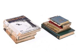 A collection of assorted books.
