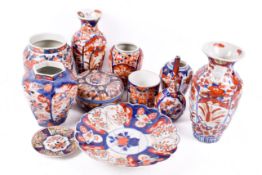 A collection of 19th and 20th century Japanese and other Imari patterned ceramics (AF).