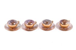 James Stinton for Royal Worcester, a set of four coffee cups and saucers.