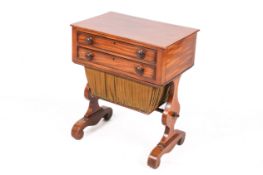 A Victorian rosewood sewing table.