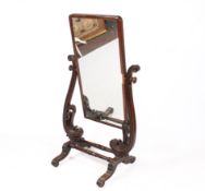 A Victorian mahogany veneered cheval swing mirror.