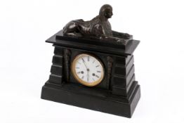 A late 19th century Egyptian revival slate eight-day mantle clock.