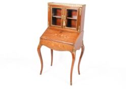 A Napoleon III rosewood Bonheur Du Jour.