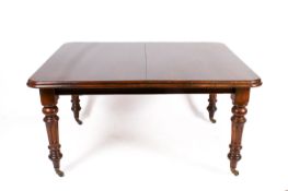 A 19th century Victorian extendable dining table.