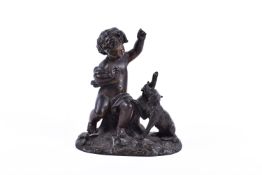 A 20th century bronze model of a cherub playing with a dog.