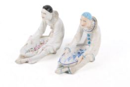 Two 19th century porcelain sweetmeat dishes in the shape of Pierrot.