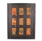 A small mounted 19th century Chinese carved hardwood folding screen.