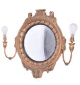 A 20th century gilt convex wall mirror.