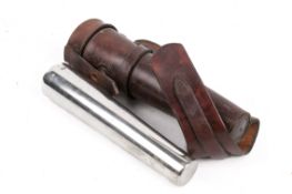 An early 20th century pewter conical flask in original leather case.